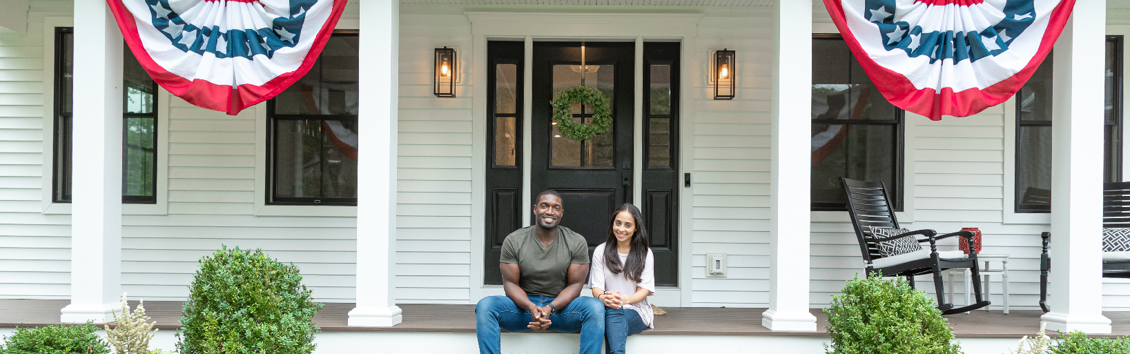 military homebuyers on front porch